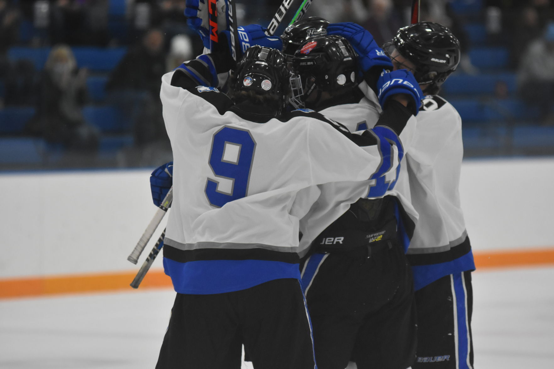 (Owatonna Boys Hockey) goal celebrate.JPG